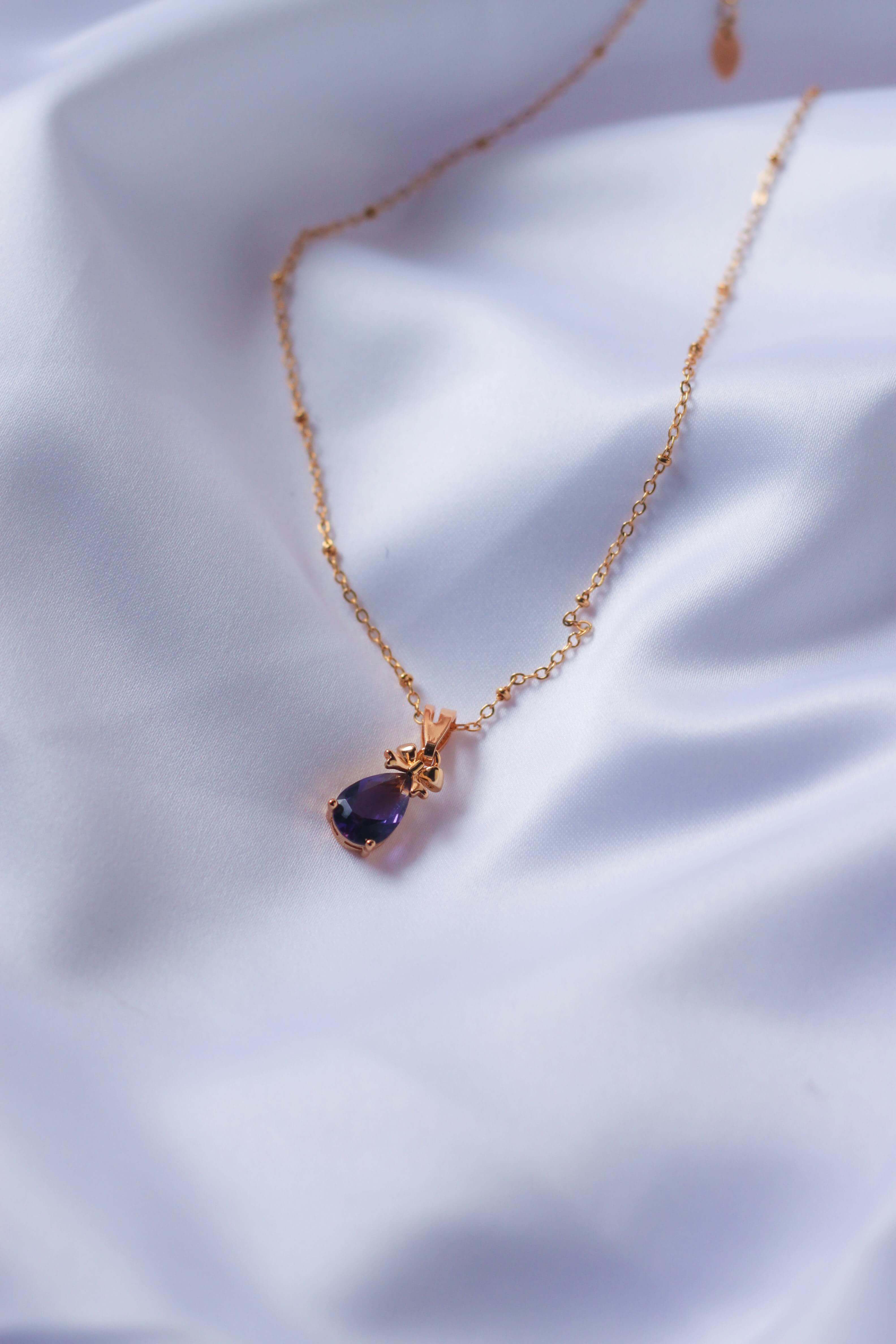 purple diamond pendant necklace